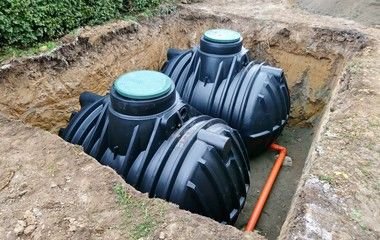 below ground rainwater tank being installed in Ipswich