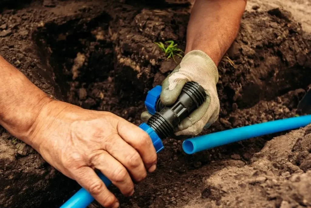 plumber setting up garden irrigation